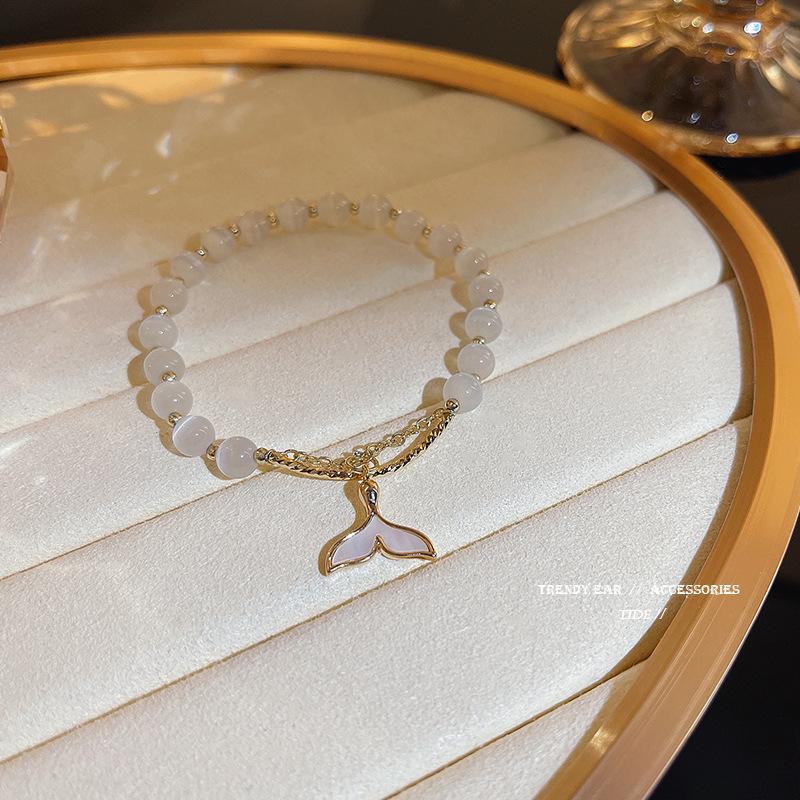 

Dongdaemun Cat s Eye Stone Bracelet - Women s Trendy Fishtail Design S196 золотой