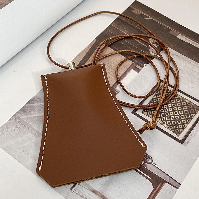 

Магнітний тримач для окулярів на шию: Багатофункціональна сумка з PU шкіри для подорожей на природі та капелюхів.