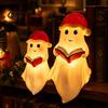 Indoor Tabletop Christmas Decor Cute Ghost Reading Book Lamp, Resin Figurine with Santa Hat, Desktop Ornament for Warm Lighted Halloween Night