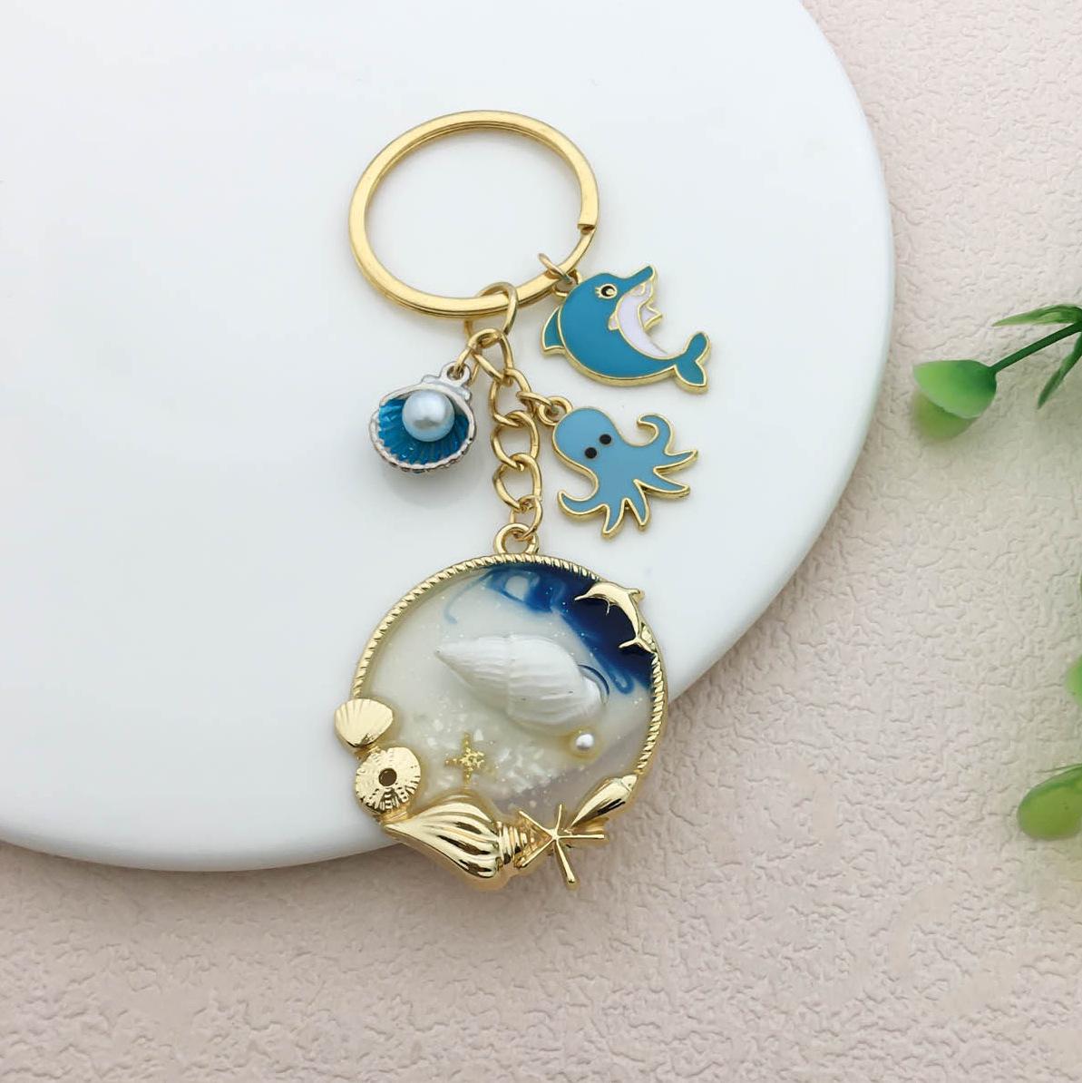 Blue Enamel Ocean Charm Keychain with Dolphin and Octopus Pendant