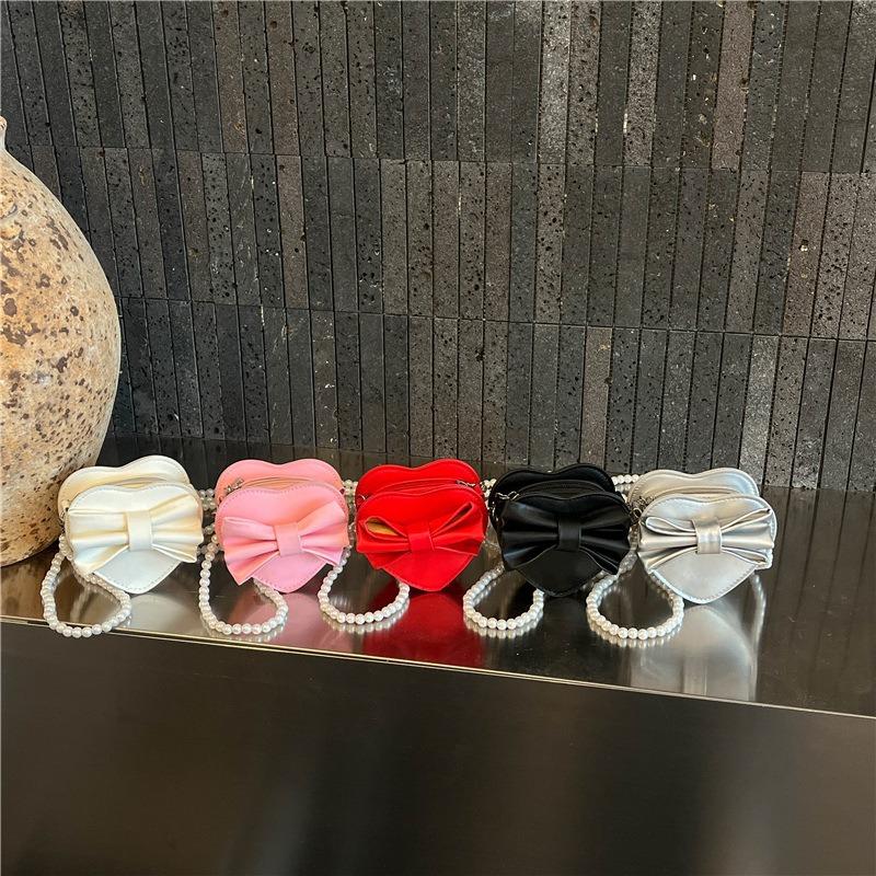 Summer new Korean version heart-shaped bow women's bag small bag foreign style shoulder bag solid color small bag messenger bag women