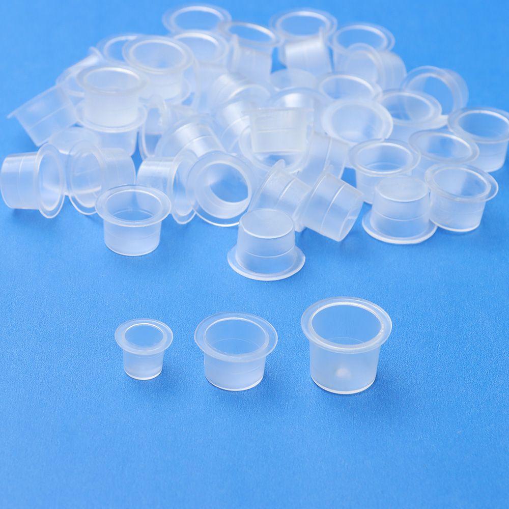 100 sztuk kubeczków na tusz do tatuażu Jednorazowe plastikowe kubeczki Kubeczki na pigmenty do body artu Pojemnik Stojak Akcesoria do makijażu i tatuażu L/M/S