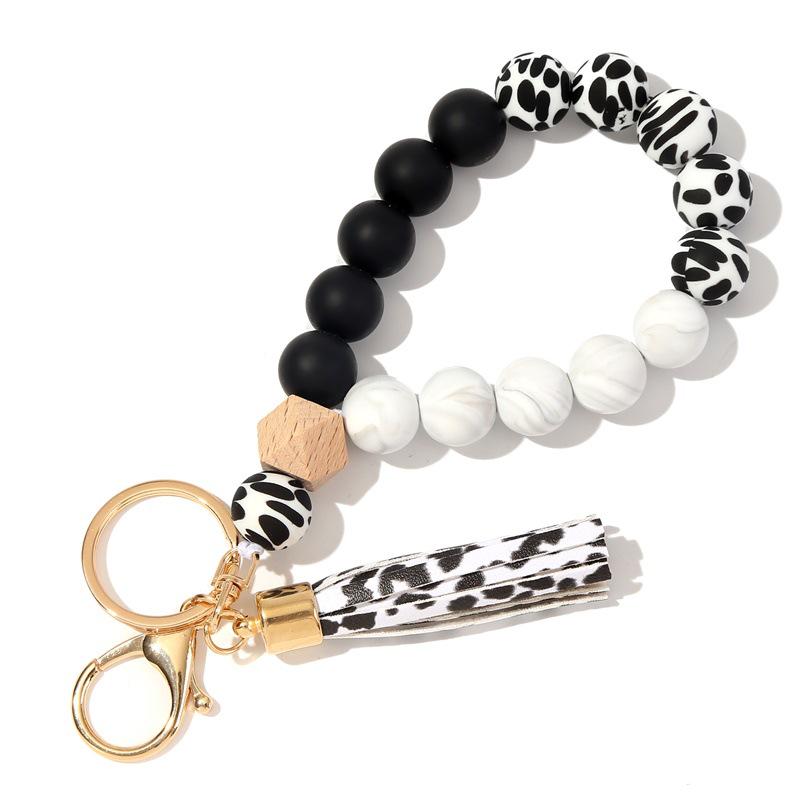 Silicone and Wooden Bead Keychain Bracelet with PU Tassel