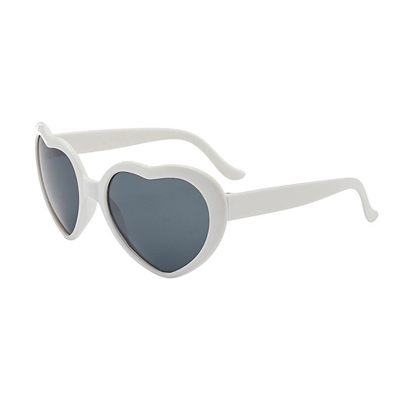 Peach heart Sunglasses love Sunglasses European and American trend frameless conjoined Sunglasses dazzling color glasses