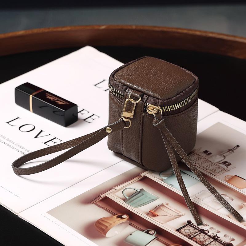 

Трендовая мини-сумочка 2025: Мягкий кожаный кошелек-ведро для монет, наушников и аксессуаров