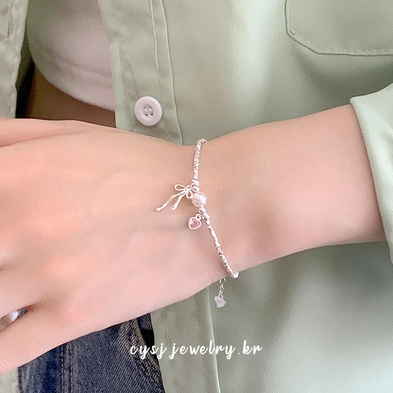 Cui Yan S925 Sterling Silver Korean Bow Bracelet with Pearl Flakes - Elegant and Sweet Design for Women