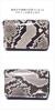 Natural Japanese-made diamond python snakeskin coin purse for men and women. Compact, small, slim, and lightweight, this mini wallet features card