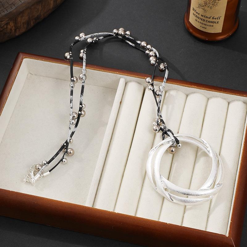 

Женское длинное ожерелье с подвеской-кольцом серебряный