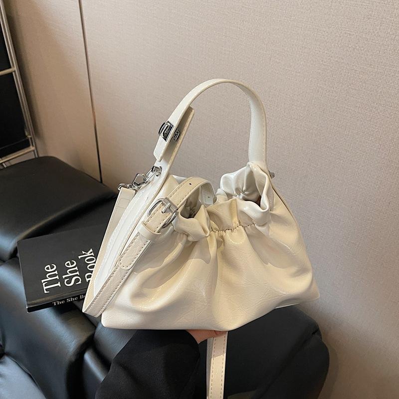 

Нишевый дизайн, ручная сумка-ведро, женская, 2025, новая летняя мода, высококлассное чувство, универсальная наплечная сумка-мессенджер