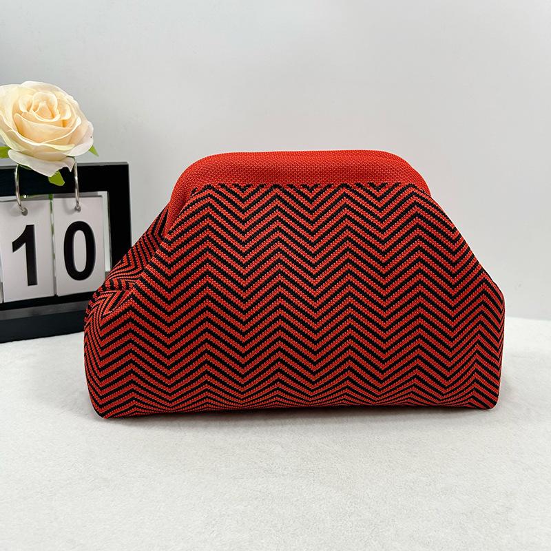 Knitted bag, striped clutch bag, women's flying woven clouds, versatile temperament, portable cosmetic bag, large capacity