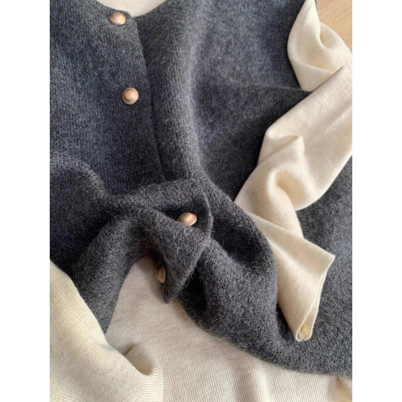 High-End Knit Vest: Women's Korean Style Sleeveless Top with Metal Buttons and Soft Shoulder Pads for Spring and Autumn.