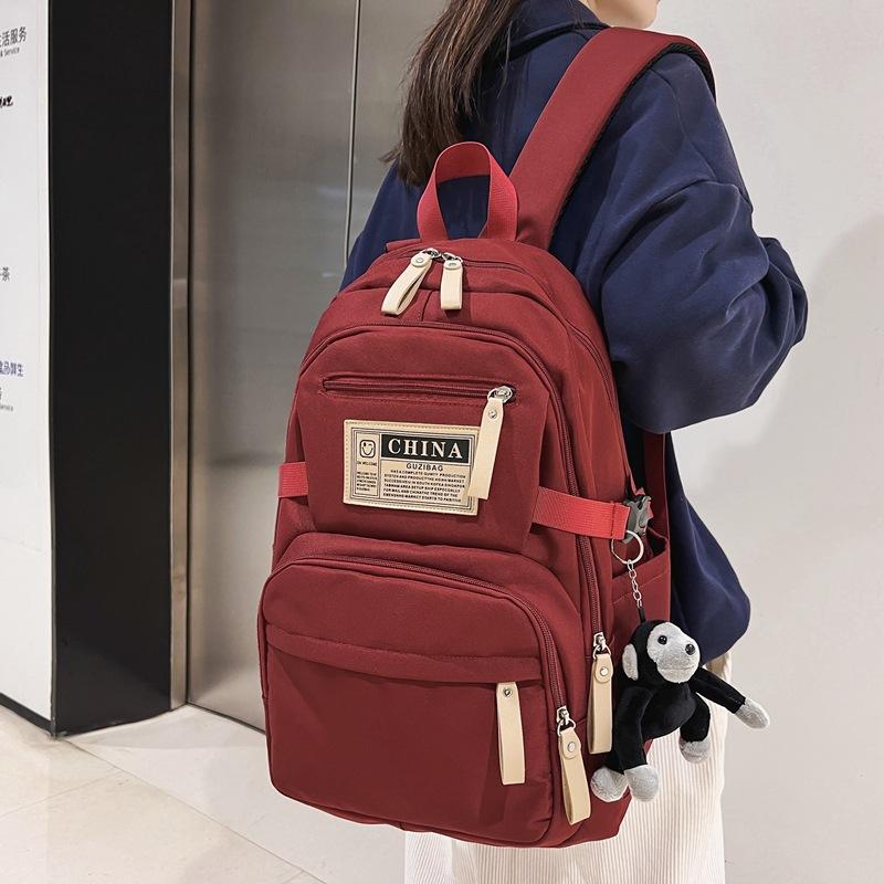 

Рюкзак Школьная сумка для девочек Сумка для ученика старшей школы Сумка для ученика средней школы Универсальный Рюкзак большой вместимости Мужской красный