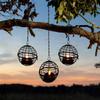 Flickering Lights Solar Hanging Lanterns Rust Iron Material Ball Cage Design Rust Iron Ball Candle Holder Solar Powered
