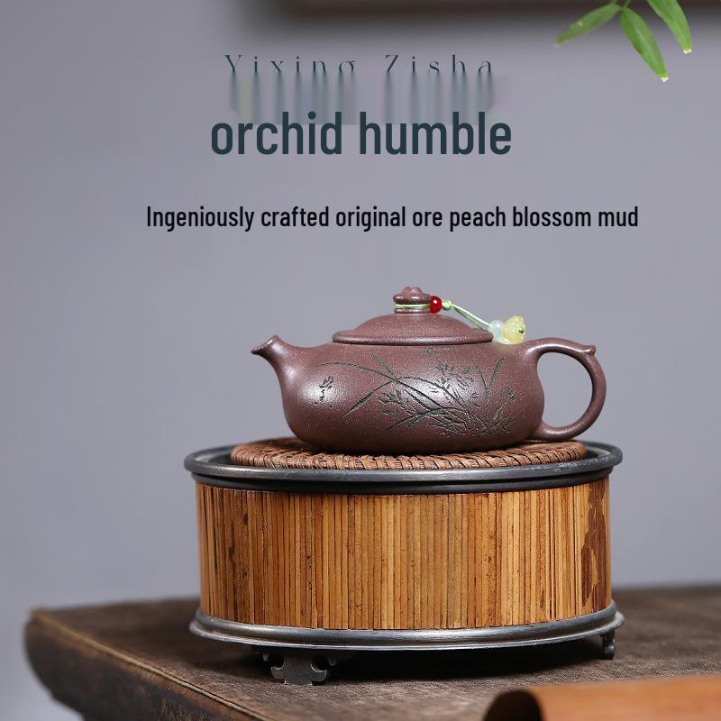 Handmade Yixing Zisha Teapot: Orchid Engraved Peach Blossom Mud 180cc
