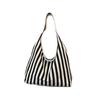 Retro Fashion Handbag Made Of Knit Cloth With Top Handle And Casual Design