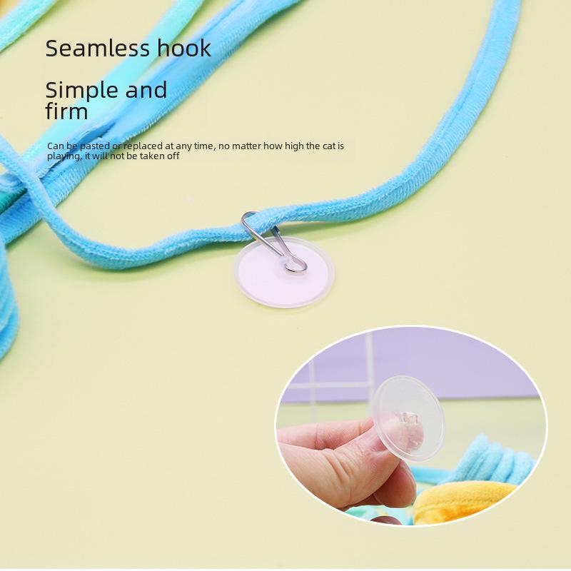 "Selbstunterhaltendes Katzenspielzeug aus Plüsch mit Feder und Saugnapf"