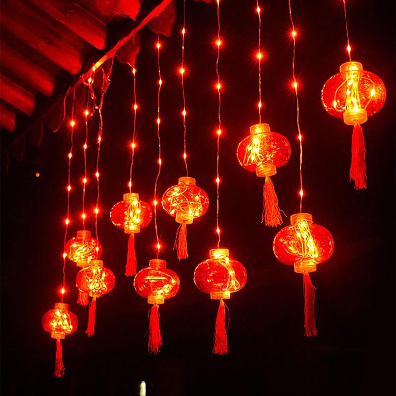 Spring Festival LED Red Lantern Ornaments: Solar Fu Character Colored String Lights for New Year Balcony Decor.