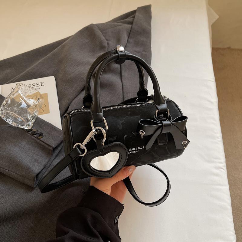 Fashion portable bow cylinder bag women's summer new personalized mirror pendant shoulder messenger bag