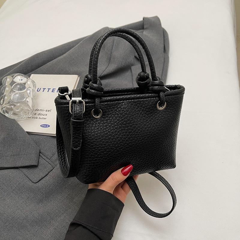 Fashion high-end hand bucket bag spring and summer simple and versatile shoulder bag trendy niche messenger bag