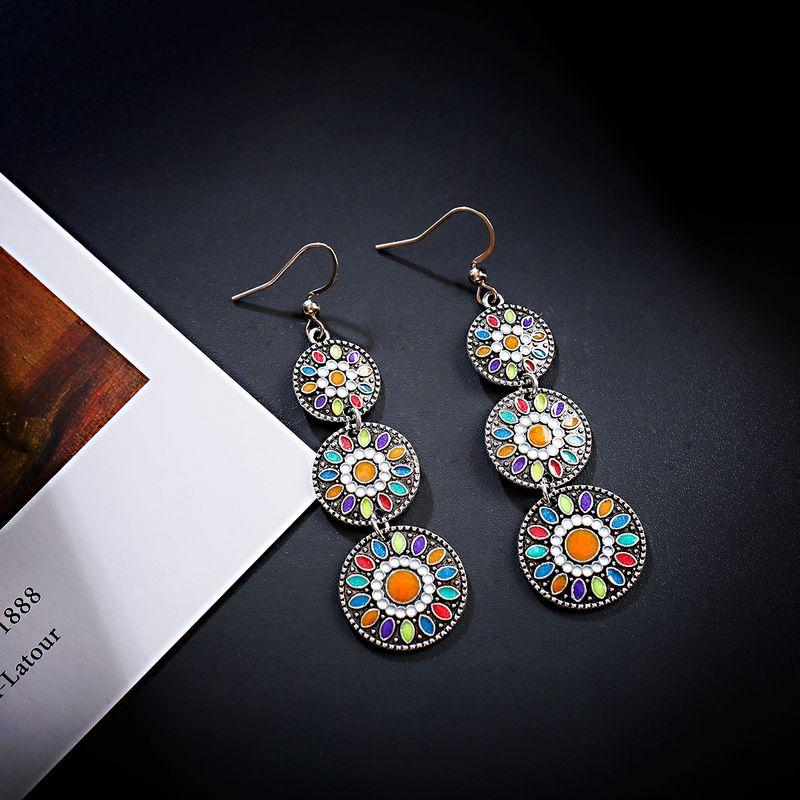 

Hot Sale Retro Nostalgic Dripping round Women s Long Earrings Orange