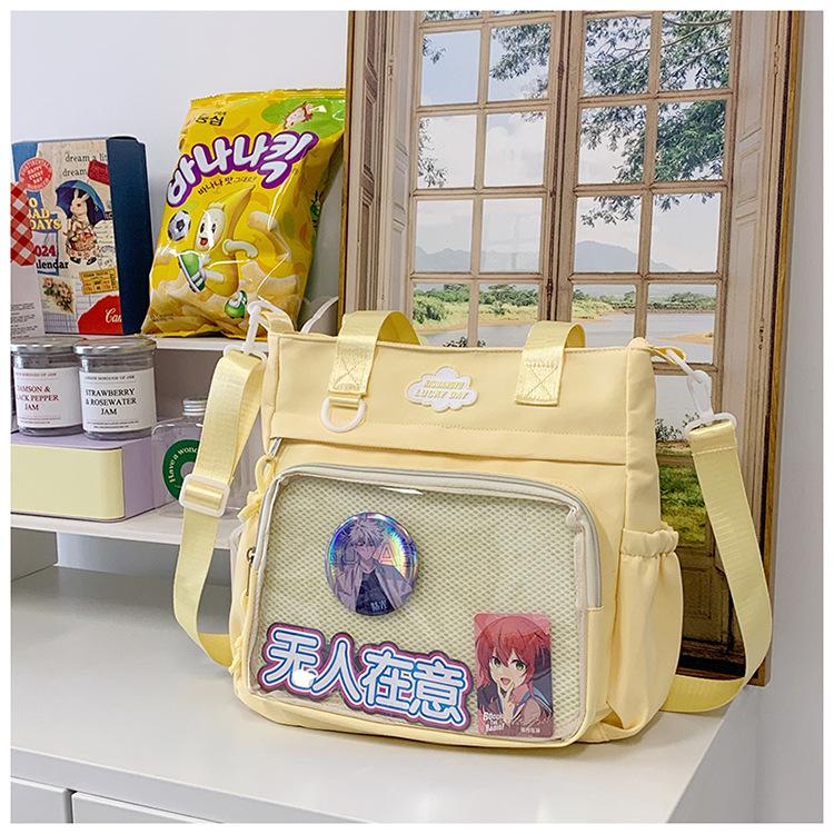 

Сумка на плечо для девочки в стиле академии, большой вместимости, двухмерная, юань, портативная, универсальная, многофункциональная сумка на плечо жёлтый