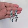 Victoria Gesture Star, Moon, and Sun Charm Earrings