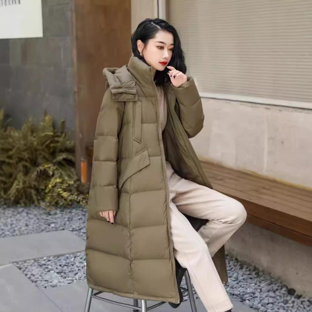 Veste en duvet premium pour femme hiver nouvelle épaissie à capuche grande couette duvet de canard blanc longueur genou ample style étranger manteau