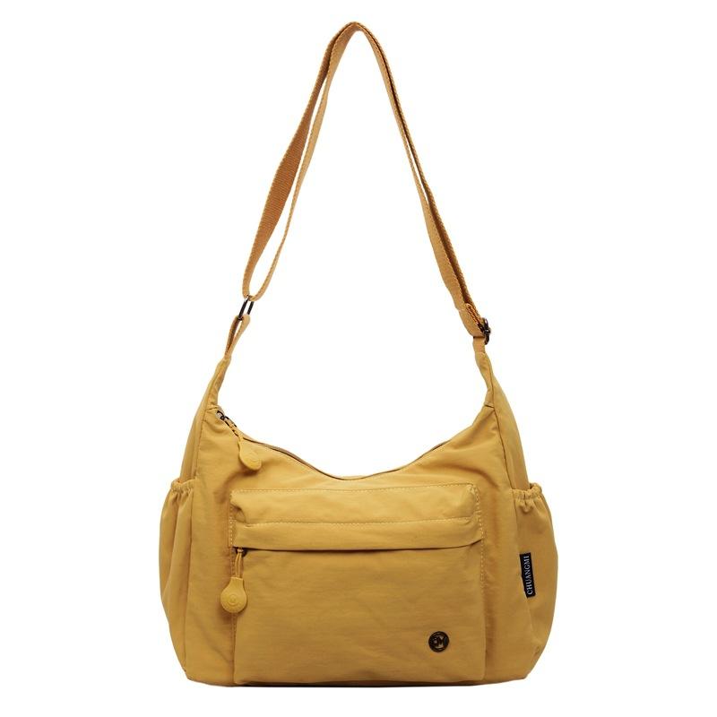 

Nyl fabric bag2026New Korean-style lightweight shoulder and crossbody bag for women20Multifunctial trendy hand-held dumpling жовтий