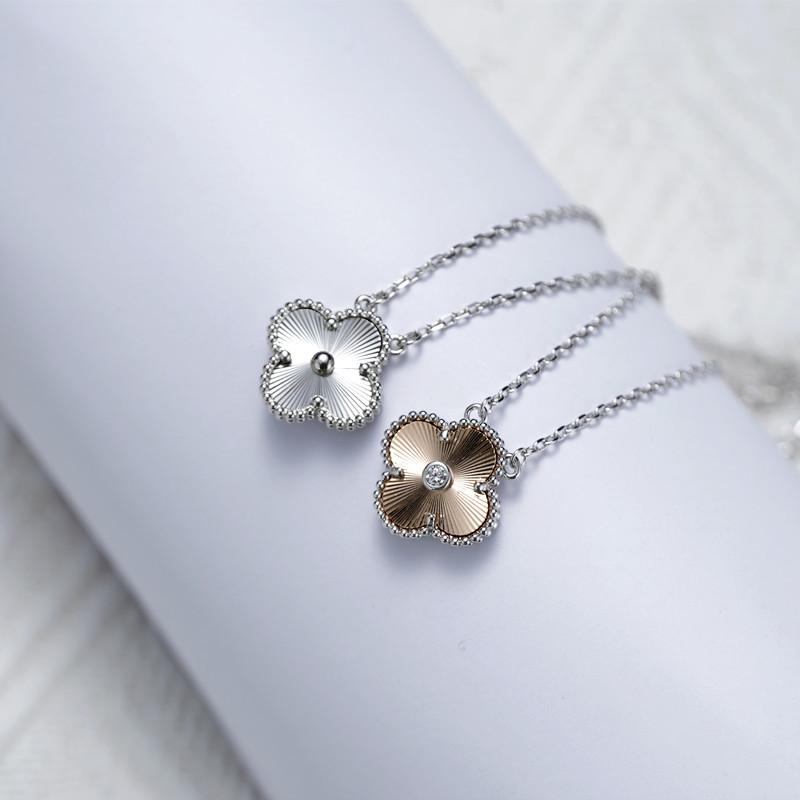 24 Christmas Clover Necklace for Women, 18K Gold-Plated, Dual-Tone with Diamonds, Durable Clavicle Chain.