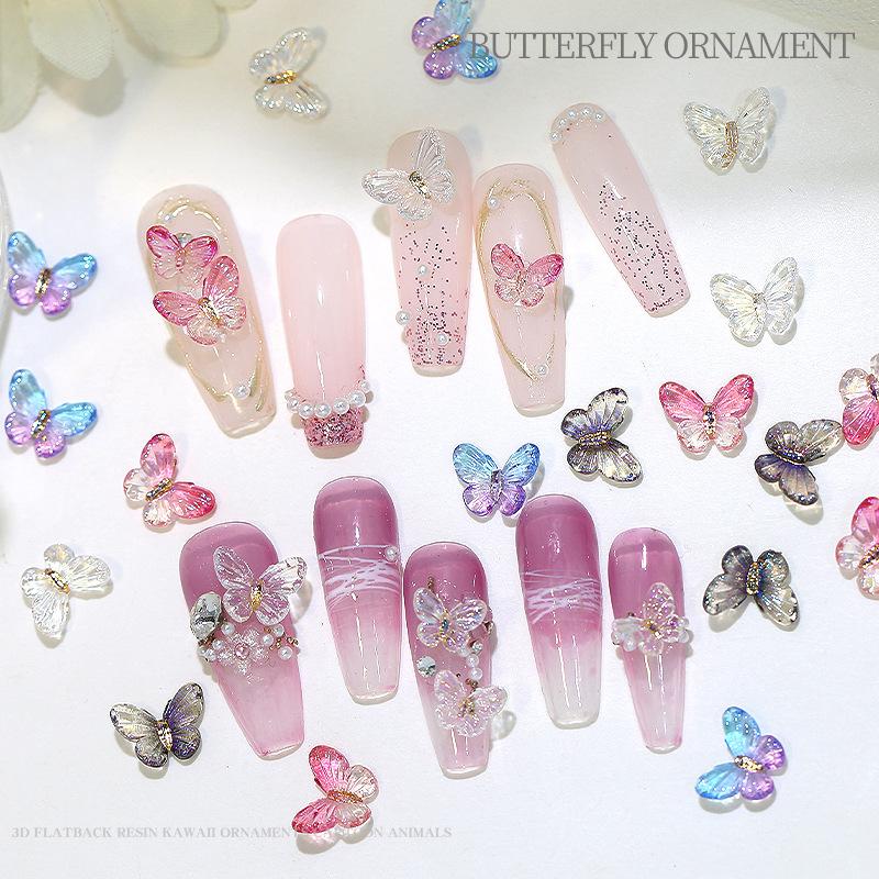 20 stuks vlinder nagelkunst accessoires - nageldecoraties met iriserende en driedimensionale vlinders gemaakt van hars voor nagelkunst.