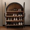 Elegant sideboard/shoe cabinet with rounded exterior, openwork rattan doors and three shelves.