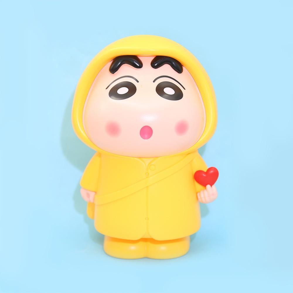 Style Unique Cartoon Raincoat Piggy Bank Featuring Xinxin Heart Design Gesture