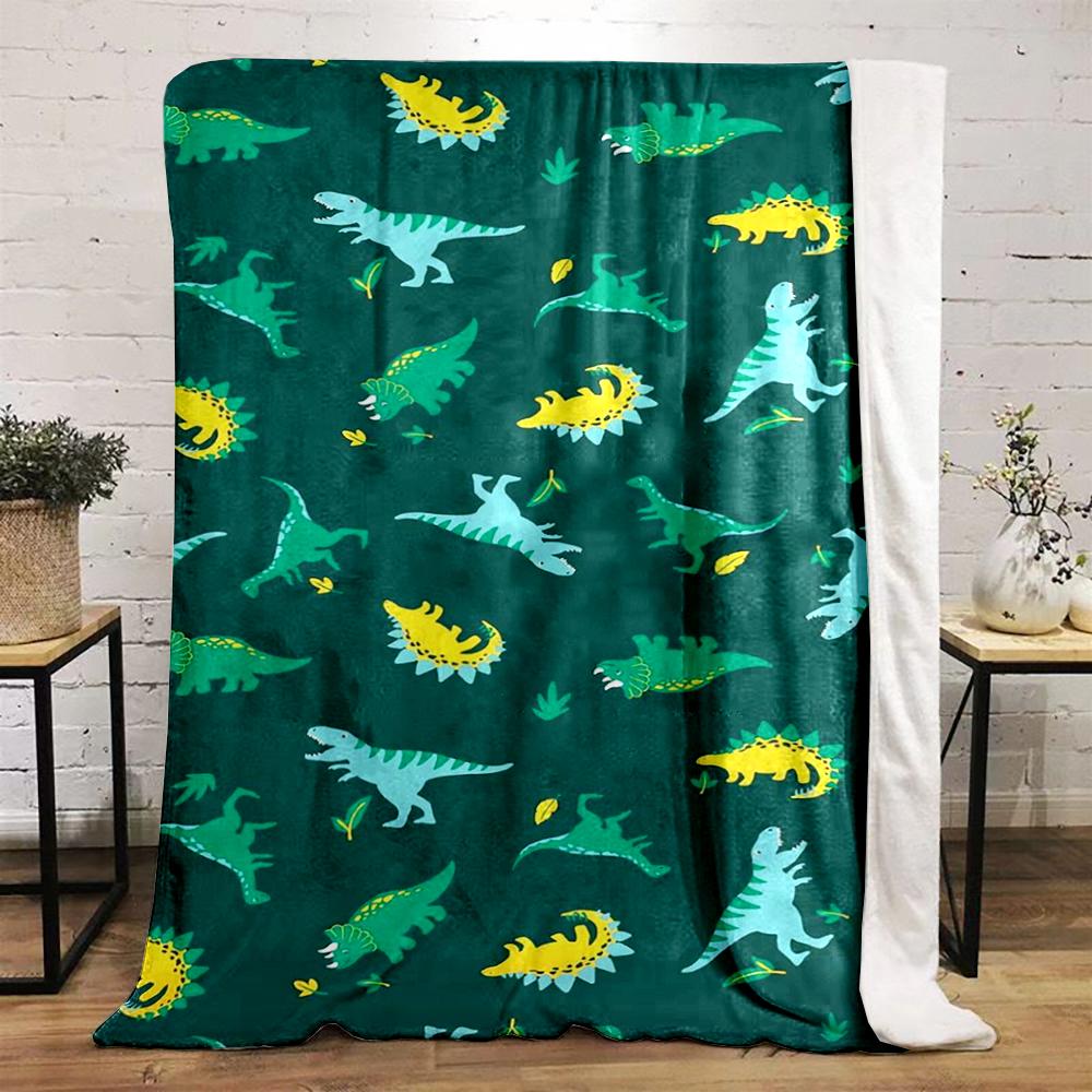 Colorful Dinosaur Pattern on Green Background Flannel blanket for bedroom, living room, sofa, and nap sofas.
