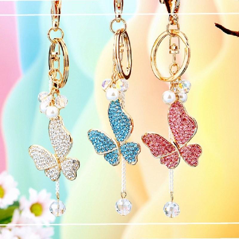 Cute Pearl Adorned Keychain With Vibrant Butterfly Design Ideal For Gift Giving Occasions