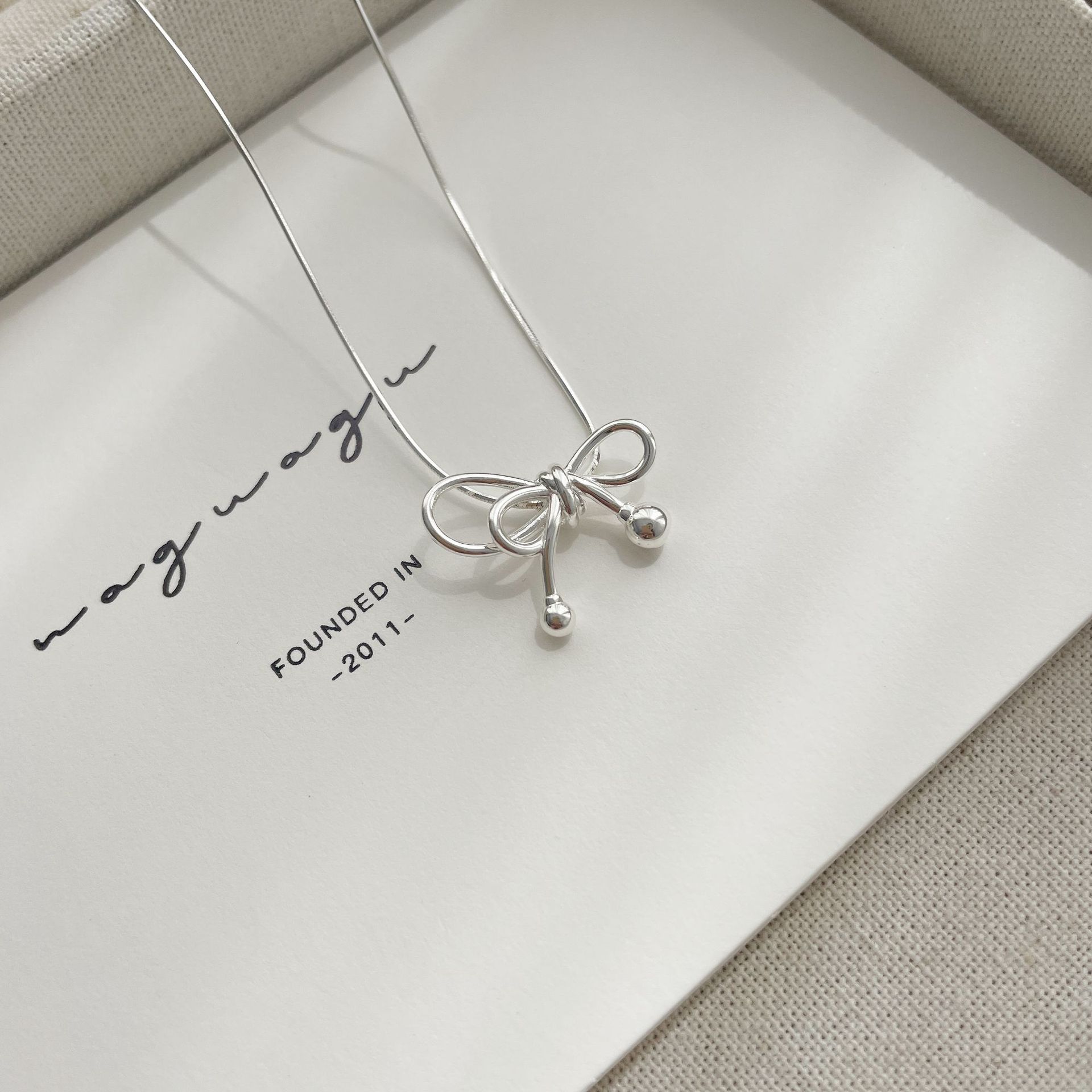 Korean version of S925 silver bow necklace female sweet Xiaohongshu explosive simple snake bone chain 925 sterling silver