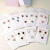 Set di Orecchini a Bottone e Collana con Quadrifoglio Fortunato - Versatile e Stiloso.