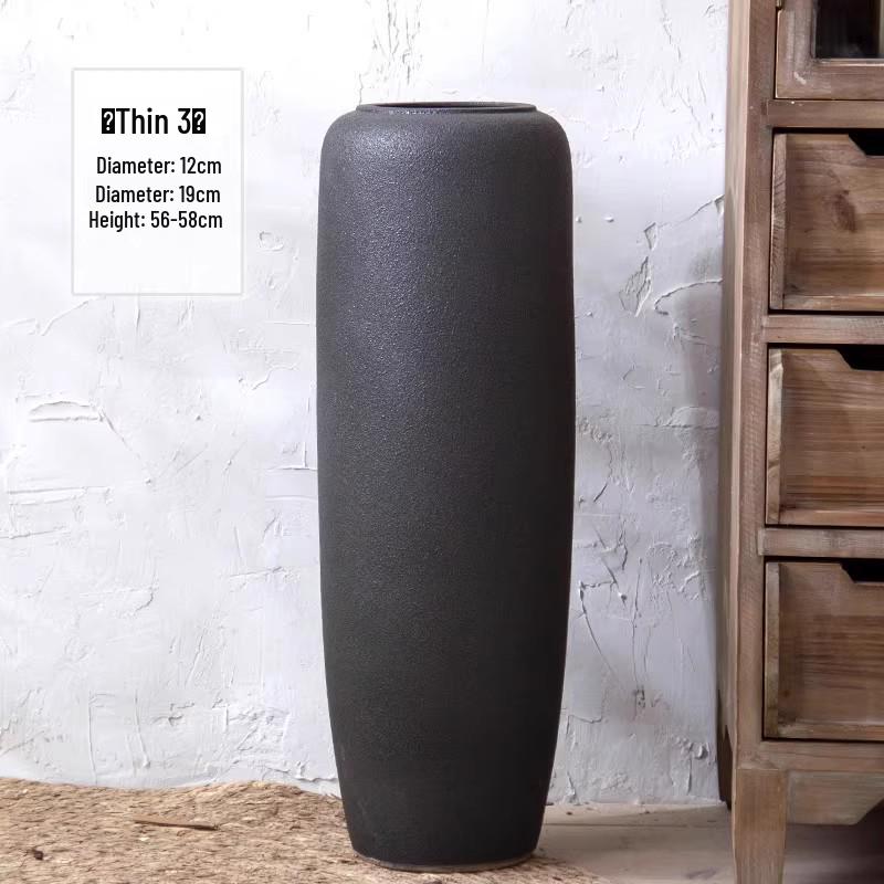 Jingdezhen Black Coarse Pottery Floor Vase: Modern Minimalist Japanese Decor for Hotel, Homestay, or Living Room.