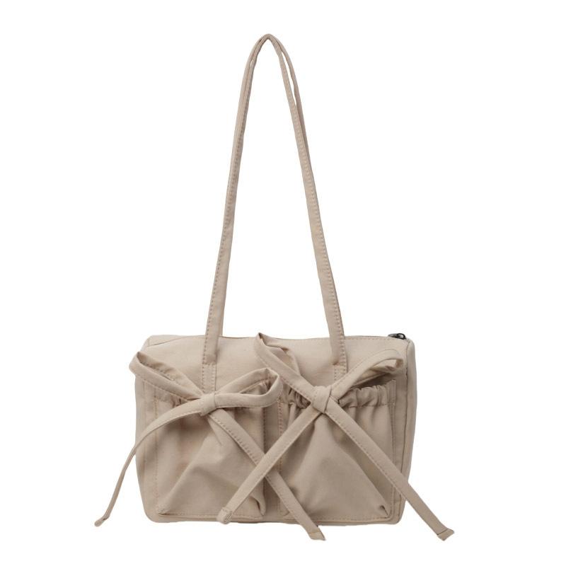 Nova bolsa tote com laço, senso de alta qualidade, bolsa de ombro de grande capacidade, bolsa axilar feminina simples de cor sólida para o dia a dia