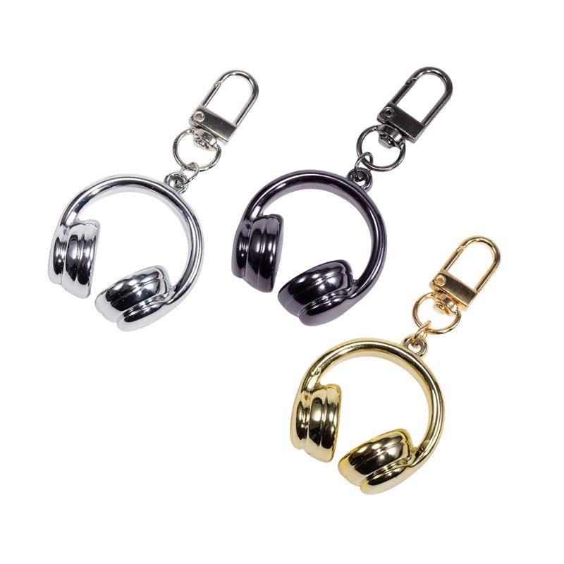 Niedlicher Kreativer 3D Kopfhörer Anhänger Schlüsselanhänger Handykette Kopfhörer Charm Rucksack Hängedekoration Zubehör Geschenk