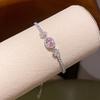 Pink Diamond Zirconia Starburst Flower Bracelet: Trendy, Luxurious Jewelry with Unique Design.