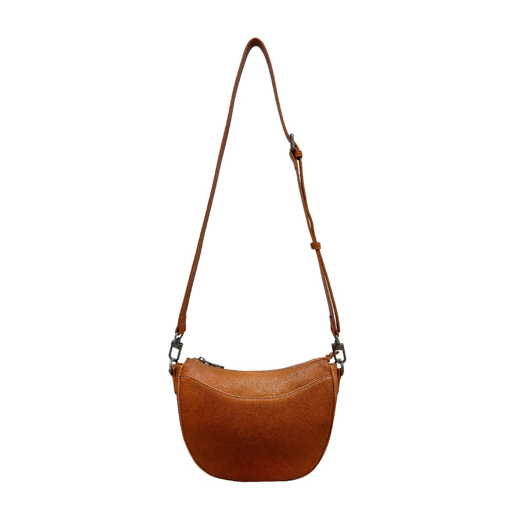 

Lightweight Crescent 2025 Vegetable-Tanned Leather Women s Crossbody Bag - Niche Design for High-End Commuting. 25x17x8 cm