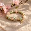 Bluebird Blessings Bracelet, Inspirational Hummingbird Strength Beaded Bracelet, Green Beads Cherry Blossoms Inspirational Jewelry for Women Spring