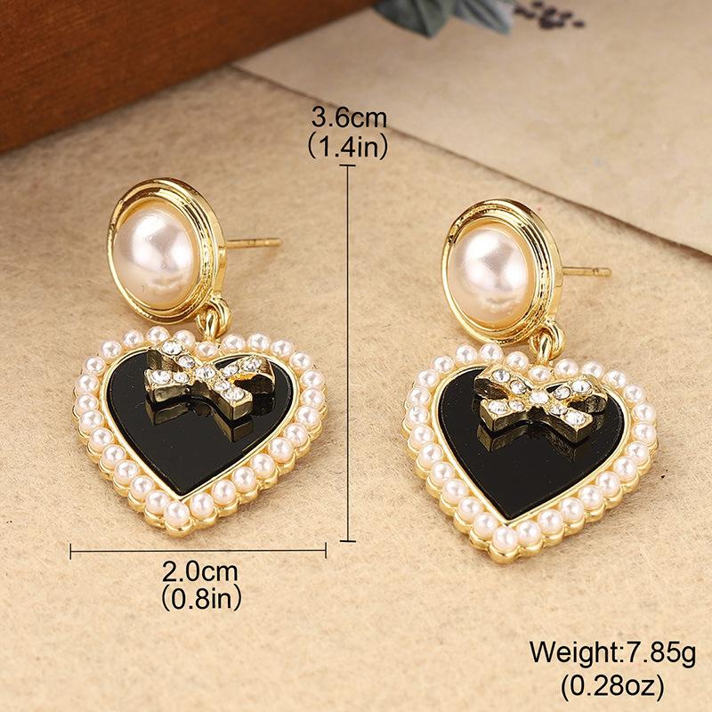 

Pearl love earrings light luxury high sense 2026 new summer versatile niche bow stud earrings fringed earrings women