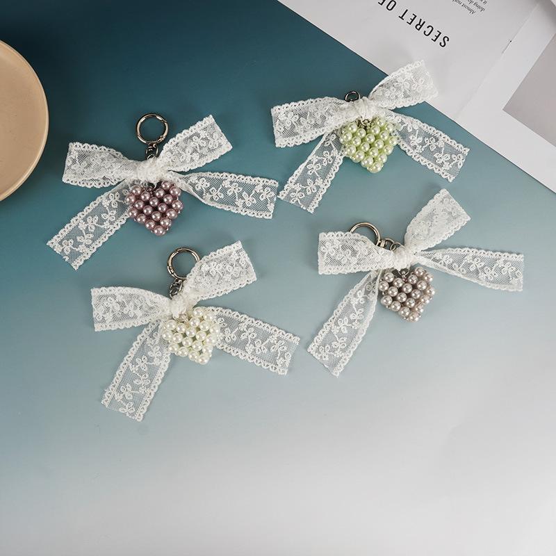 Handmade Korean Style Lace Butterfly Knot Keychain with Pearl Heart Elegant Bag Accessory Jewelry Piece from Mainland China