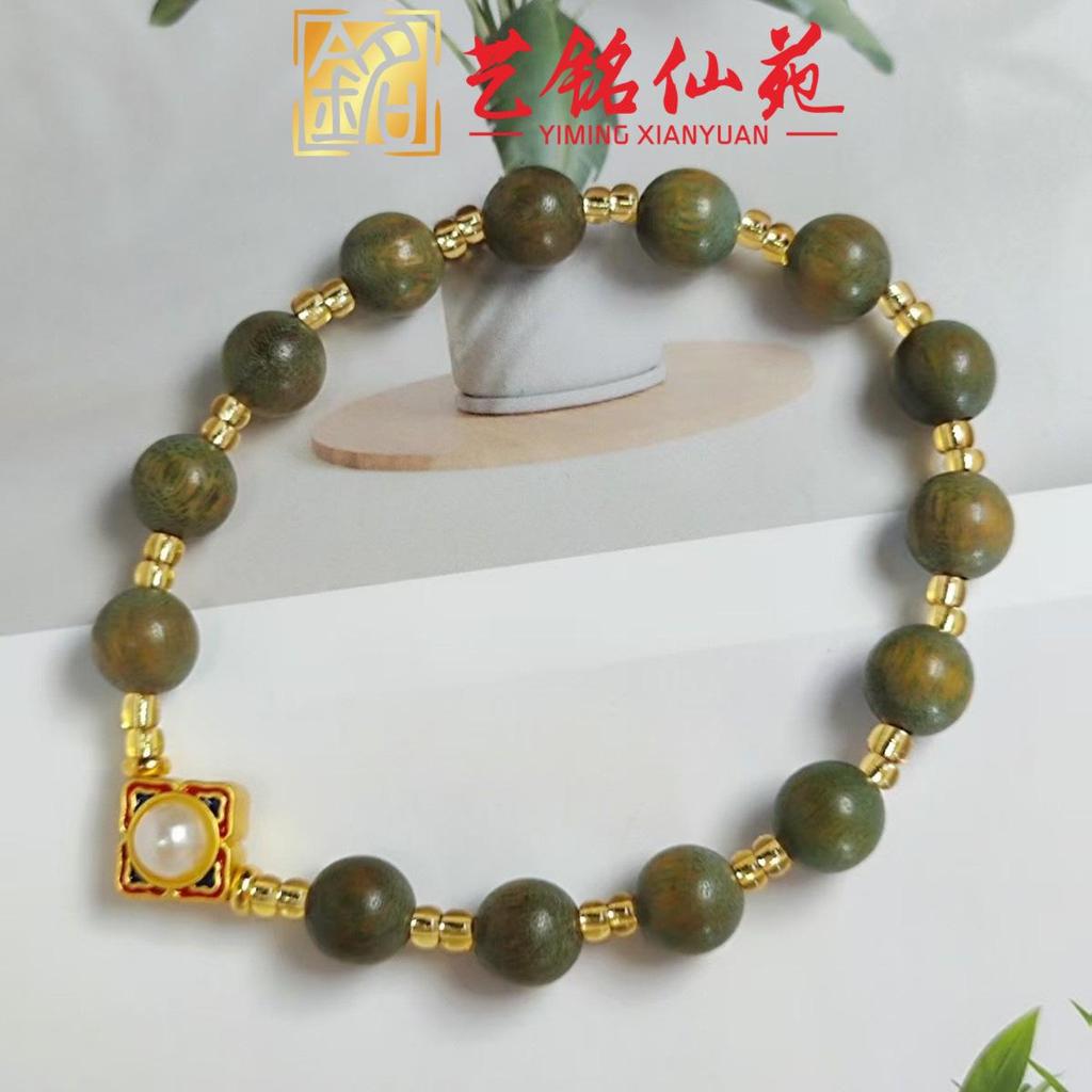 Yi Ming Xian Yuan Green Sandalwood Pearl-Accented Bracelet: New Chinese Style Couple's Prayer Beads and Ornaments.