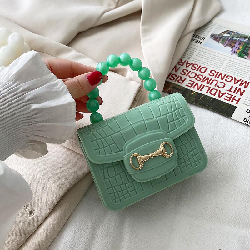Pearl stone pattern jelly bag versatile lock women's bag