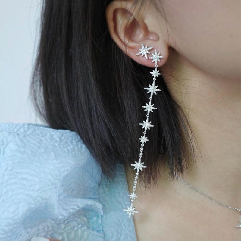 APM Monaco METEORITES/Six-pointed Star Asymmetrical Crystal-set Diamond Shines Fashionable Luxury Niche 925 Silver Earrings for Women AE11523OX