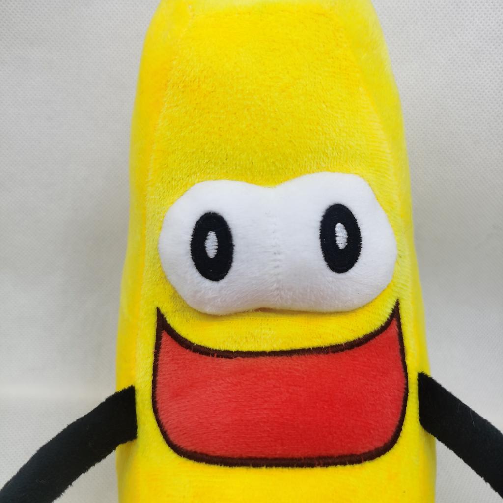 Neues Schaufelware Gehirnspiel Donut Puppe Banane Sänger