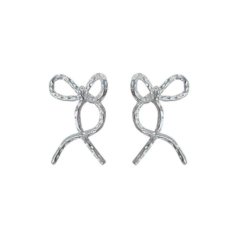 

Серьги-бантики с текстурированной лавой, свисающие сзади, индивидуальные преувеличенные серьги, нишевый дизайн для женщин