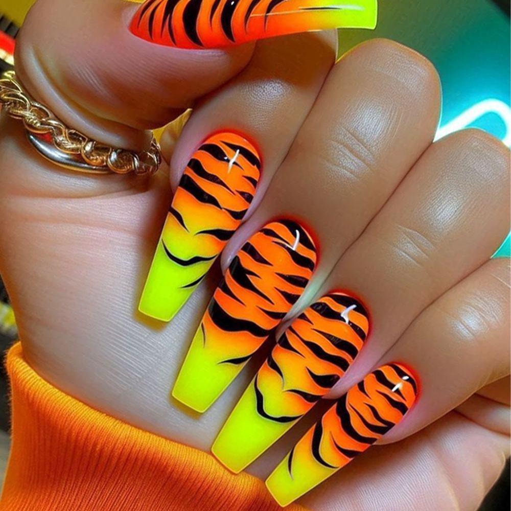 Gradient Tiger Stripe Wearable Nails - 24-Piece Set in Long Yellow-Orange.